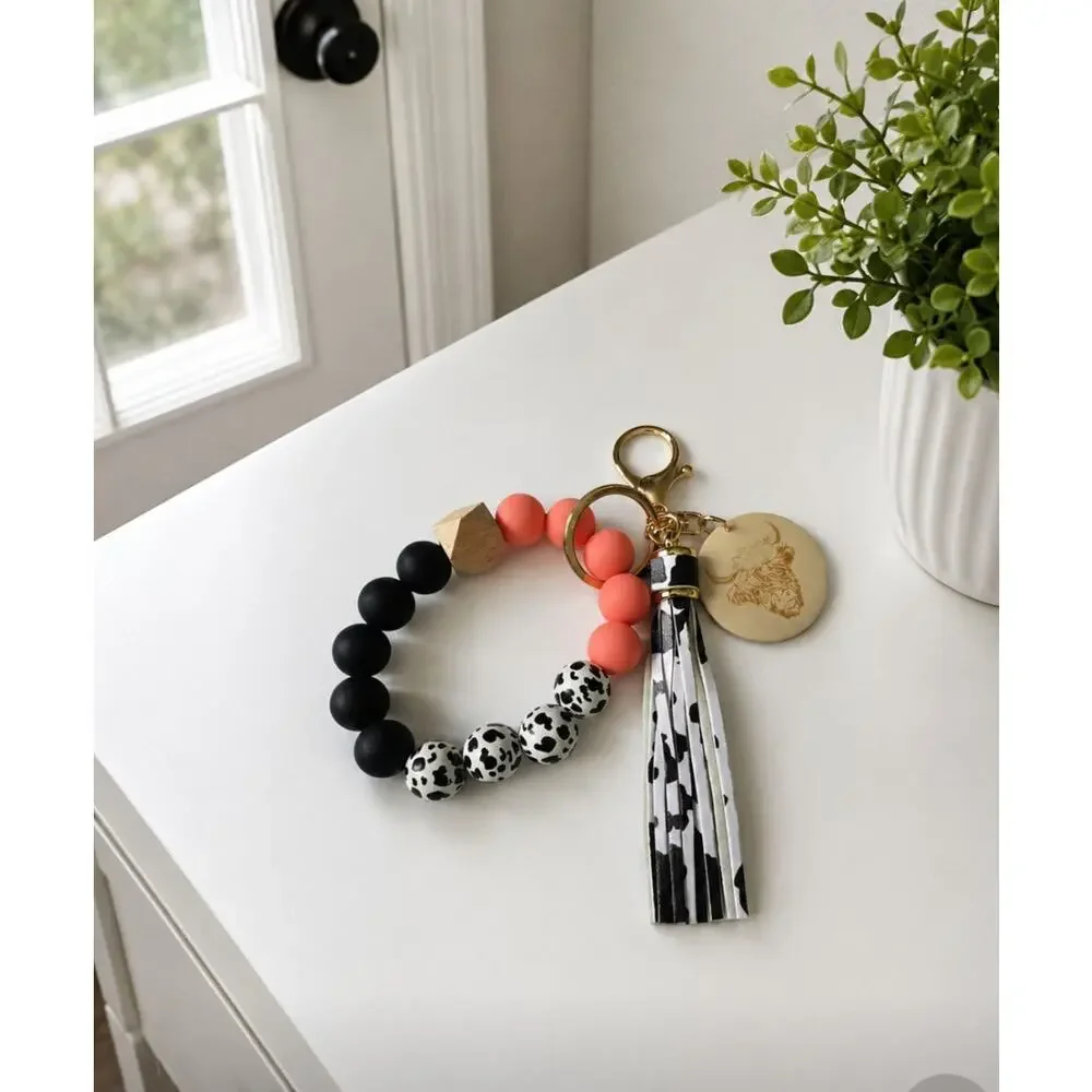 Silcone Black Mellon Cow Beaded Wrist Bag Charm New